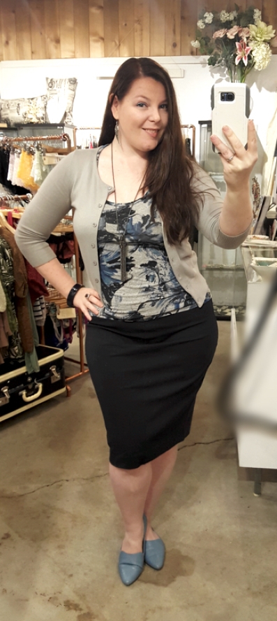 Paired with a navy pencil skirt and matching silver cotton cardigan for a professional look.